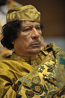 The attack ads feature images of former political figures such as Libyan leader Muammar Gaddafi. File photo